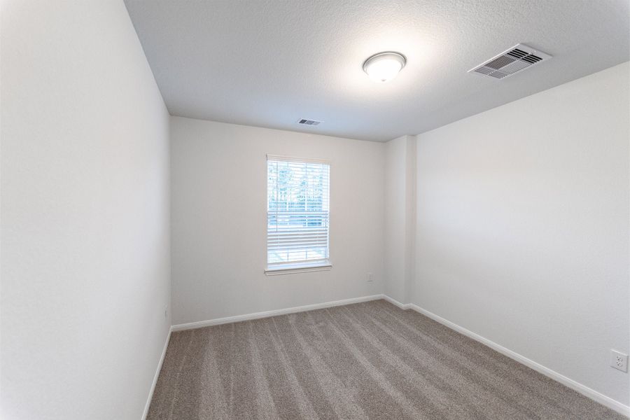 Spacious, unfurnished interior of a new home in Caney Mills, Conroe (Image 48).