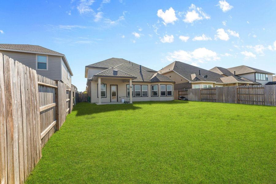 Left side angle view of back yard.