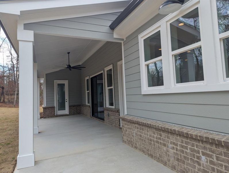 Exterior details and patio area of a home in Arden on Lanier, Cumming (Image 3).