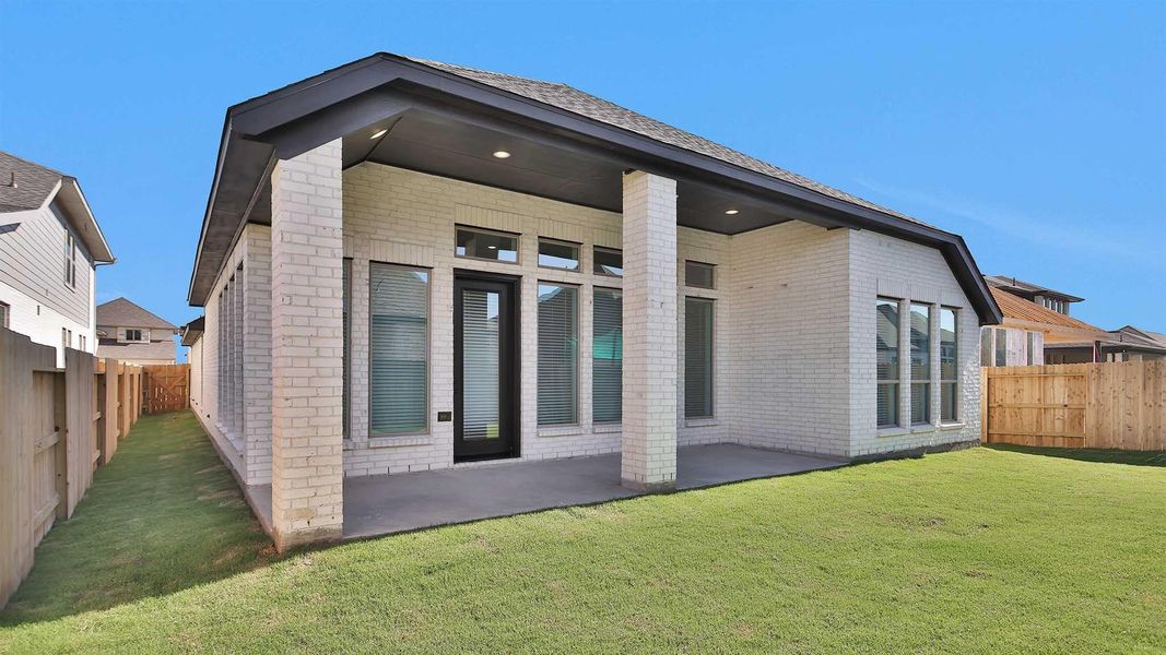 Exterior details and patio area of a home in Stonecreek Estates 50', Richmond (Image 3).