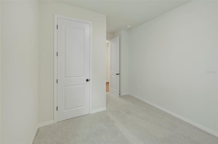 Spacious, unfurnished interior of a new home in Waterset Tradition Series, Apollo Beach (Image 14).