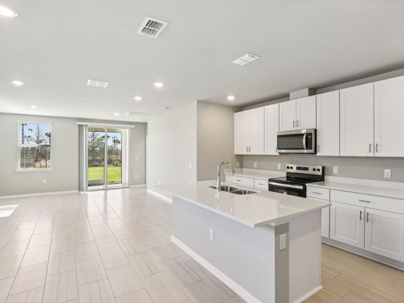 Furnished interior view inside a new home in Crescent Lakes - Premier Series, Punta Gorda (Image 6).