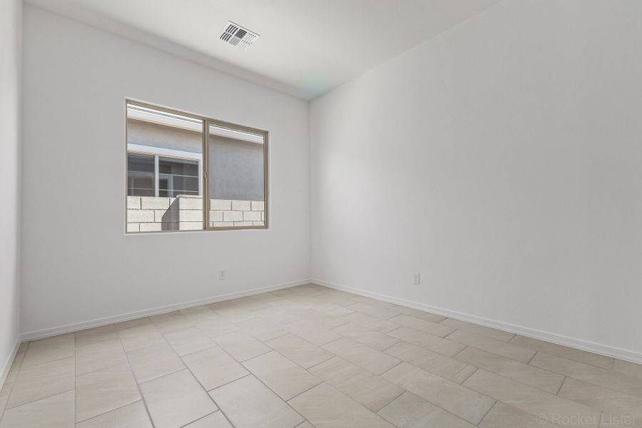 Spacious, unfurnished interior of a new home in Empire Pointe, Queen Creek (Image 11).