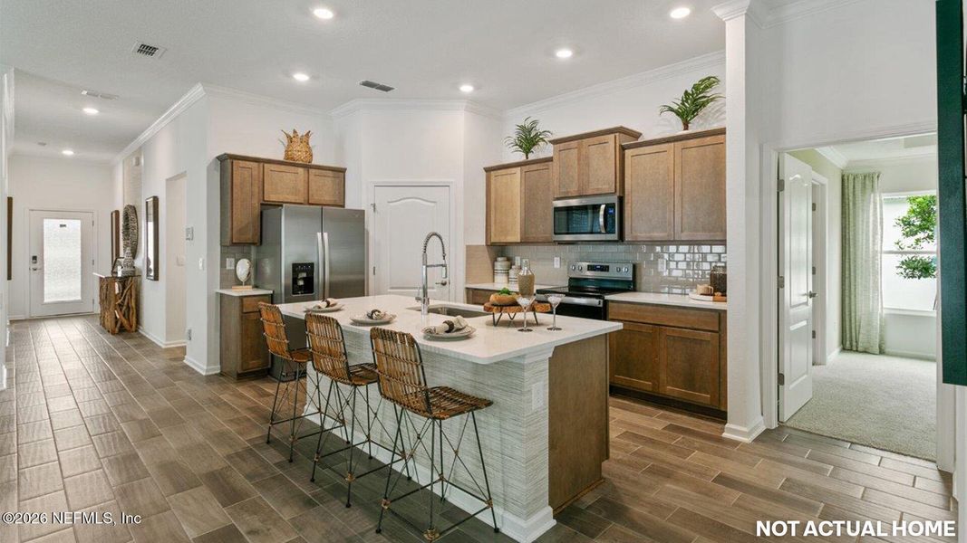 Furnished interior view inside a new home in Sawmill Branch, Palm Coast (Image 9).