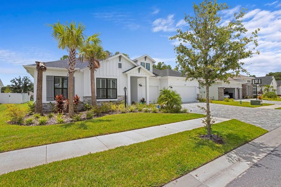 Front exterior of a new home in , Odessa, FL, highlighting curb appeal (Image 21).