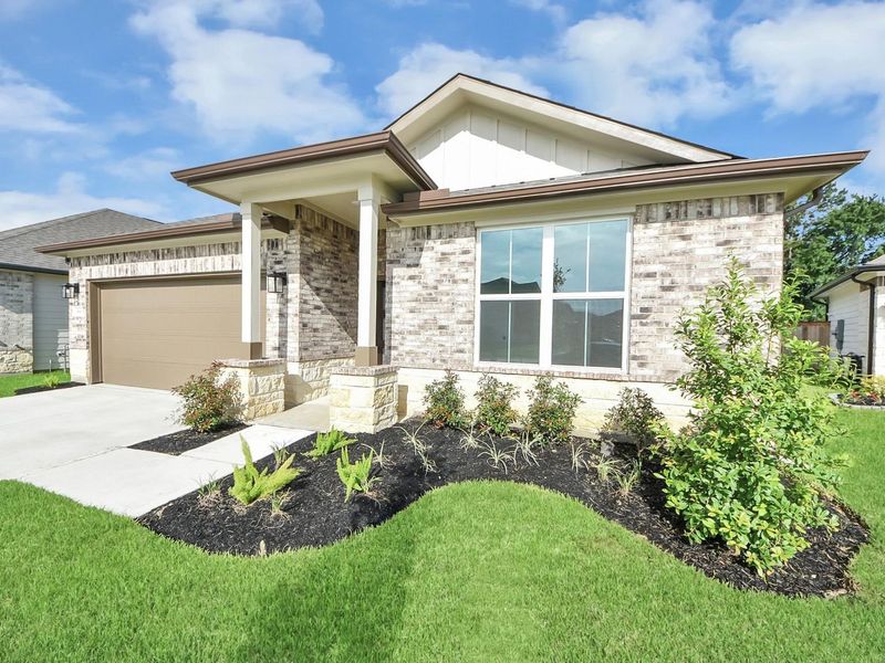 Front exterior of a new home in Sundance Cove, Crosby, TX, highlighting curb appeal (Image 2). Front exterior of a new home in Sundance Cove, Crosby, TX, highlighting curb appeal (Image 2).