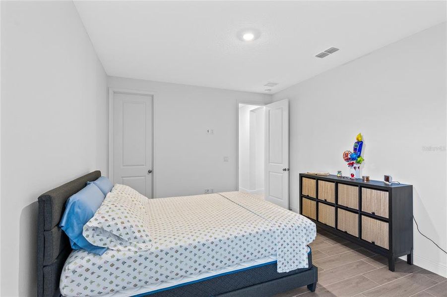 Furnished interior view inside a new home in Laureate Park, Orlando (Image 37).