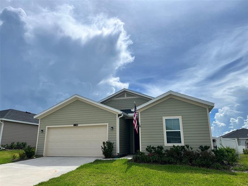 Front exterior of a new home in , Alachua, FL, highlighting curb appeal (Image 2).
