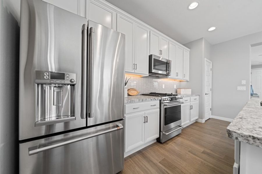 Furnished interior view inside a new home in Rancho Mercado, Surprise (Image 9).
