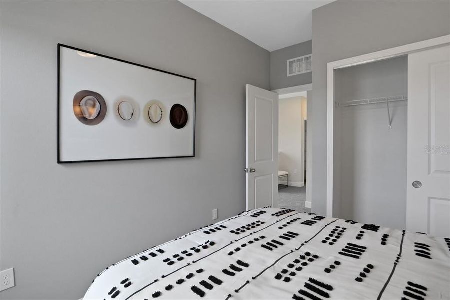 Furnished interior view inside a new home in Serenade at Ovation, Winter Garden (Image 25).