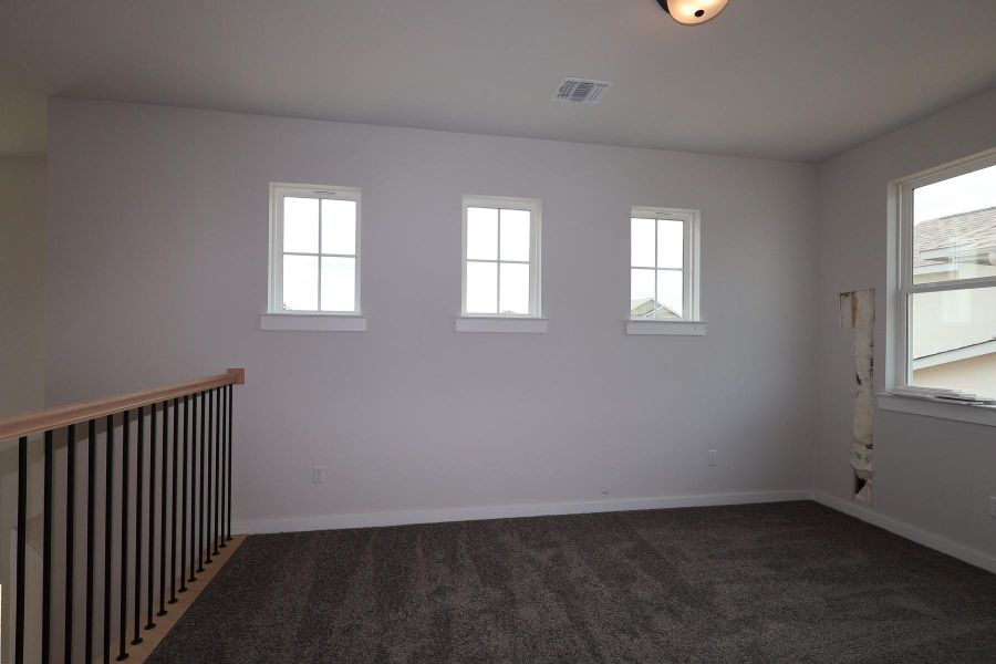 Spacious, unfurnished interior of a new home in Flora, Hutto (Image 13).