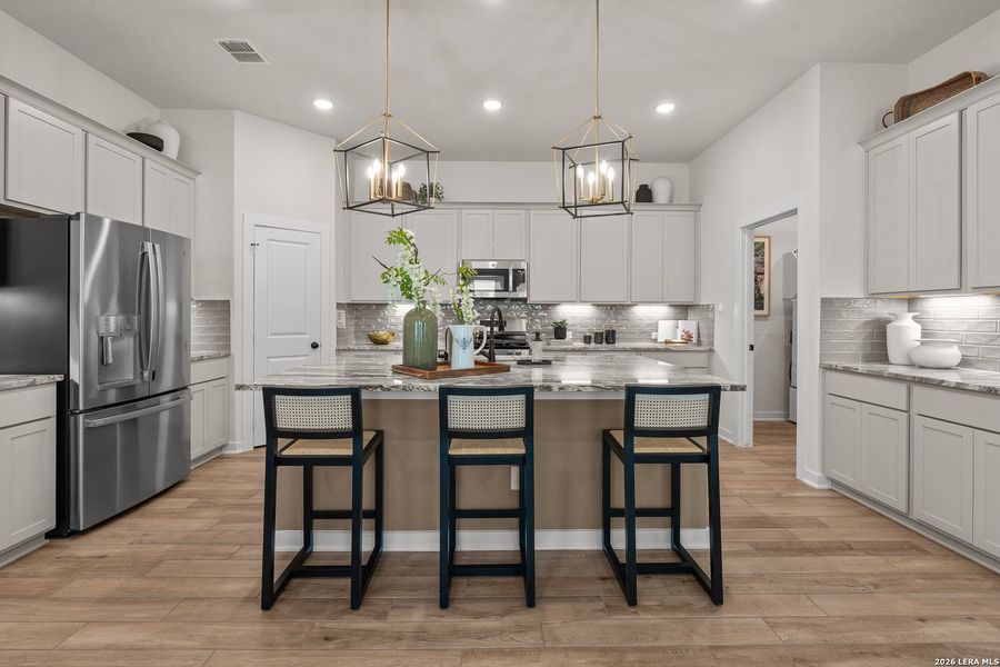 Furnished interior view inside a new home in The Crossvine, Schertz (Image 30).
