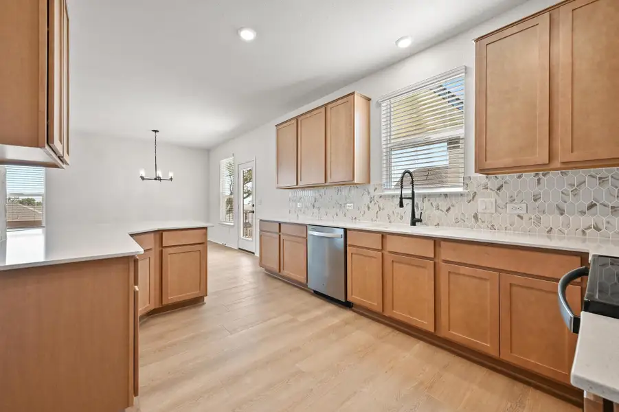 Furnished interior view inside a new home in Creekside at Estancia, Austin (Image 5). Furnished interior view inside a new home in Creekside at Estancia, Austin (Image 5).