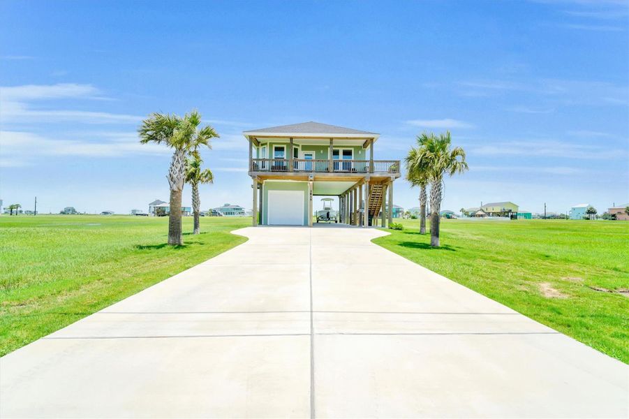 Front exterior of a new home in , Galveston, TX, highlighting curb appeal (Image 1). Front exterior of a new home in , Galveston, TX, highlighting curb appeal (Image 1).