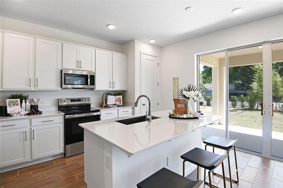 Furnished interior view inside a new home in Seaport Village, Tavares (Image 14).