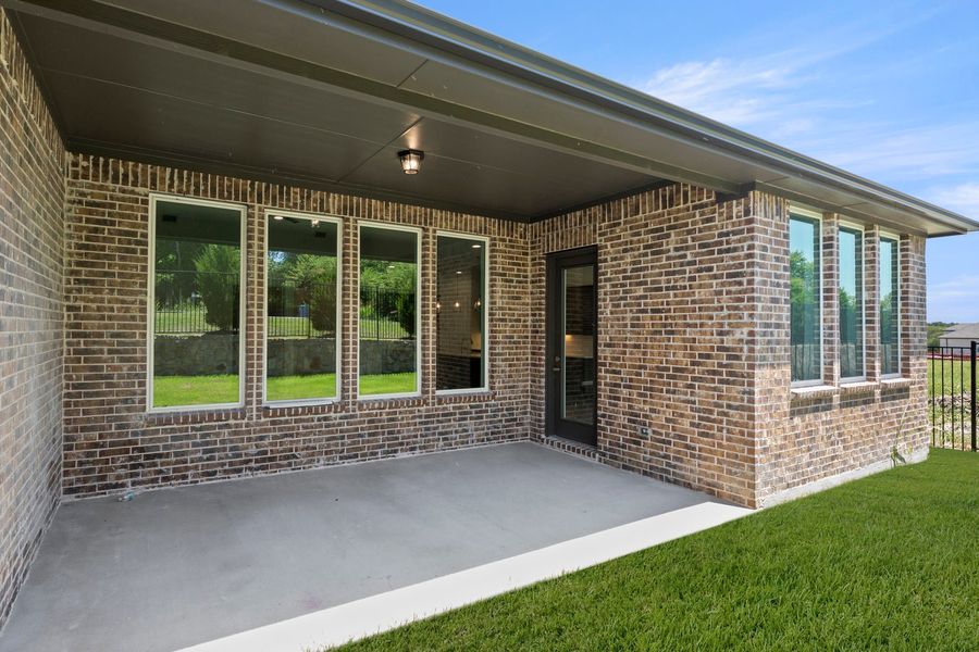Exterior details and patio area of a home in Nelson Lake Estates, Rockwall (Image 2). Exterior details and patio area of a home in Nelson Lake Estates, Rockwall (Image 2).