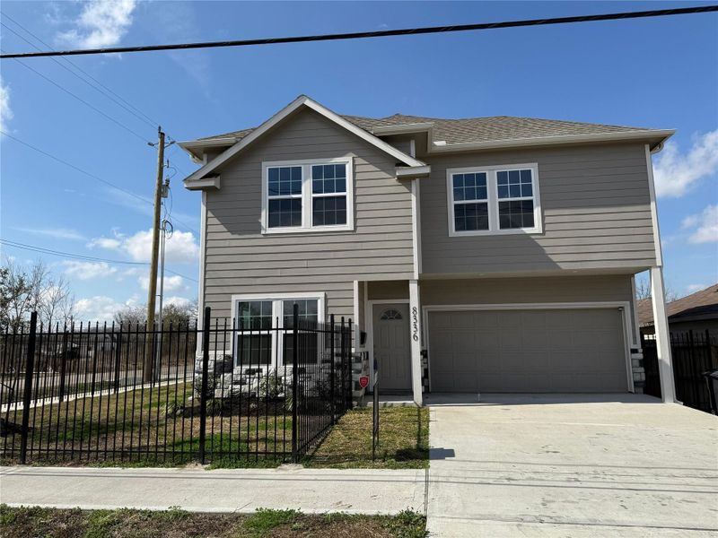 This home boasts great curb appeal with a welcoming, large front patio perfect for relaxation and entertaining.