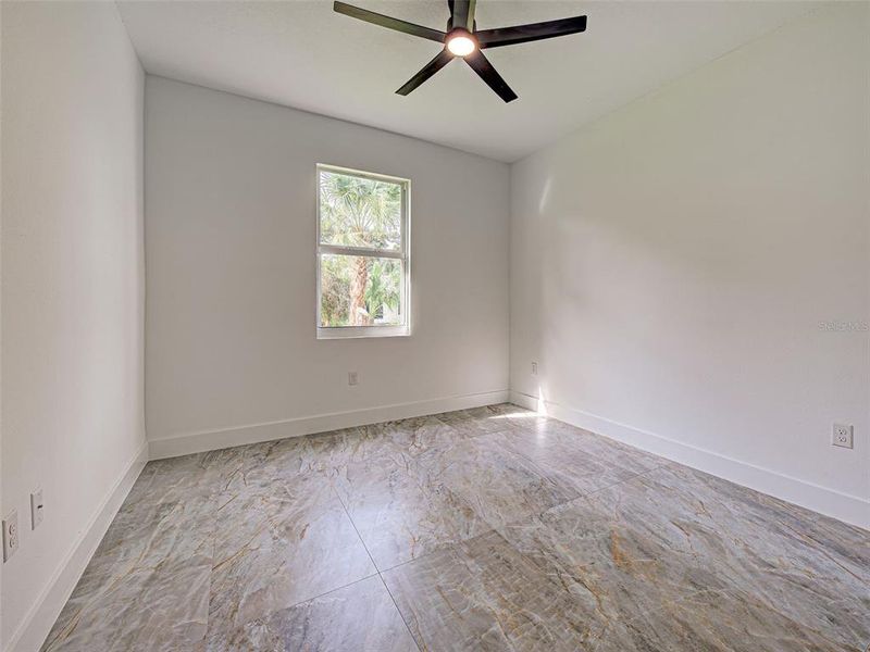 Spacious, unfurnished interior of a new home in , Port Charlotte (Image 35).