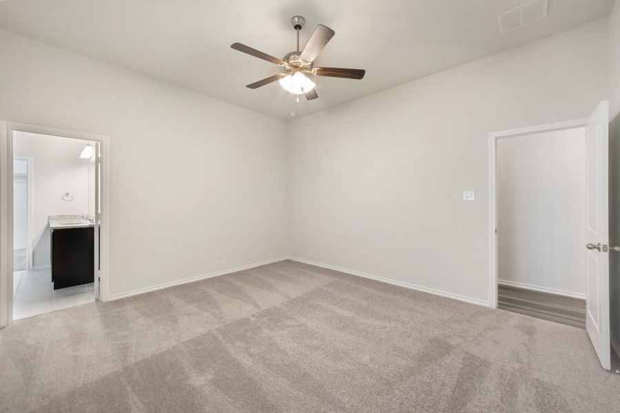 Representative exterior photo of a completed home built from the Harwood by Impression Homes in Heartland, Heartland, TX (Image 18).