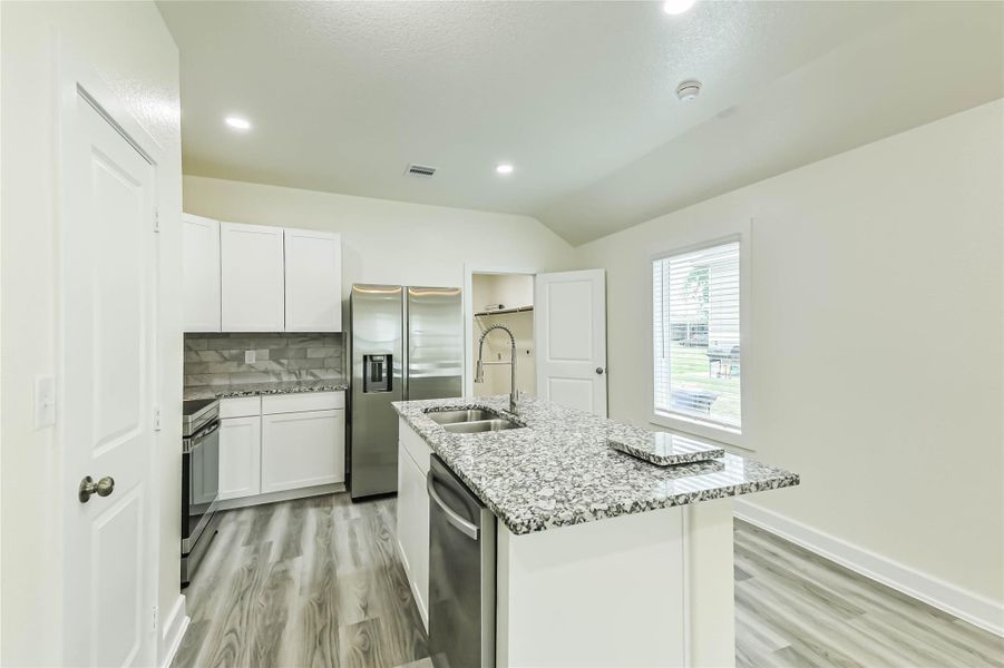 Furnished interior view inside a new home in , Conroe (Image 9).