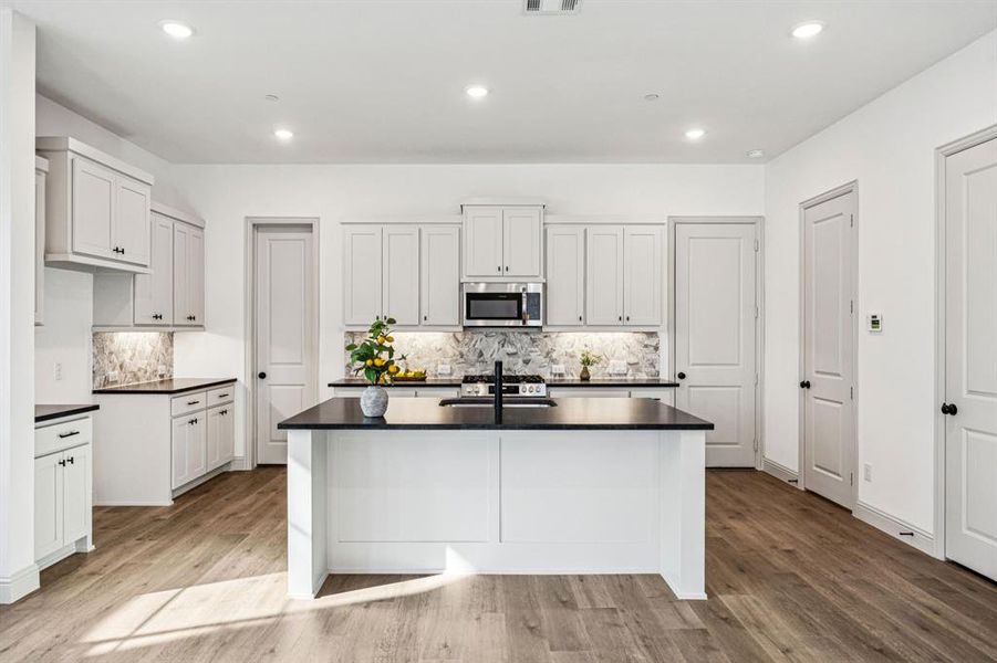 Our Wyatt plan offers a dream kitchen that is beautifully finished with everything you have been searching for! Our Wyatt plan offers a dream kitchen that is beautifully finished with everything you have been searching for!