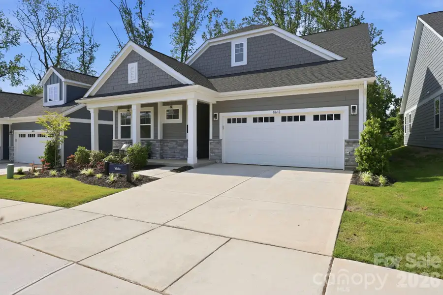 Front exterior of a new home in , Cornelius, NC, highlighting curb appeal (Image 1). Front exterior of a new home in , Cornelius, NC, highlighting curb appeal (Image 1).