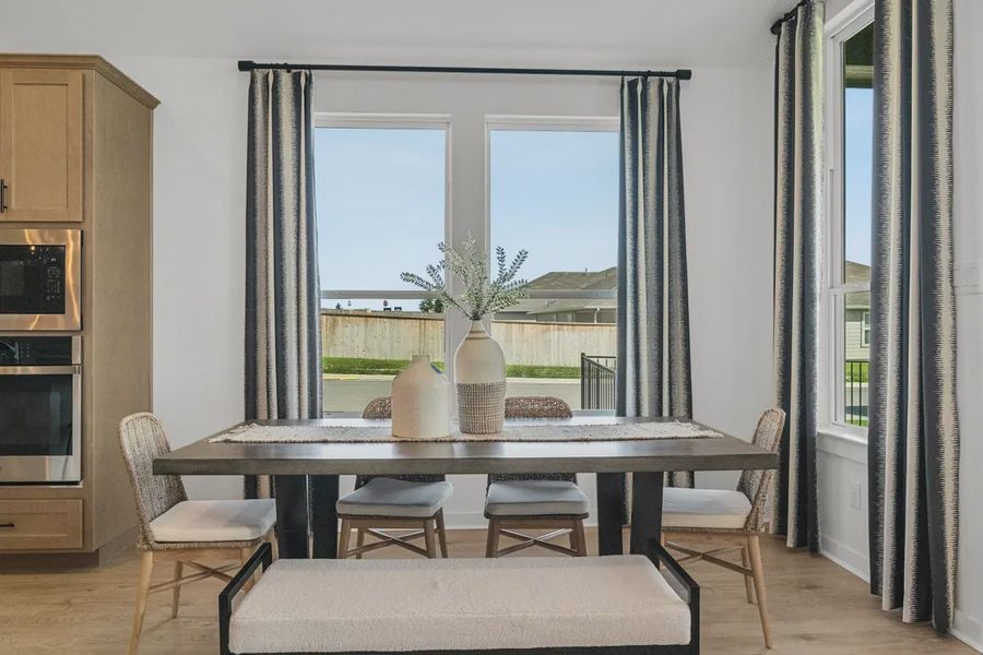 Representative furnished interior of a home built from the Mariah by Chesmar Homes in University Heights, McKinney (Image 31).