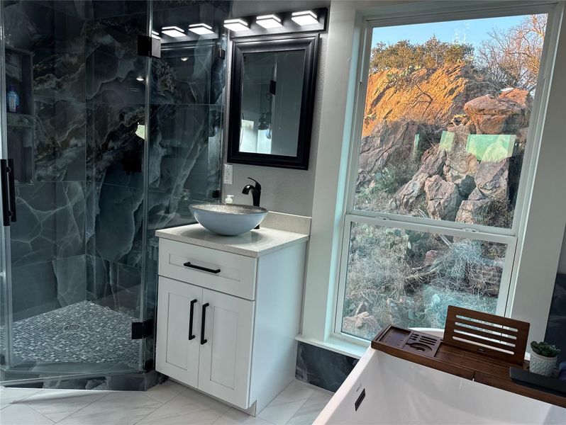 Stand alone shower with ceiling to floor designer tiles Stand alone shower with ceiling to floor designer tiles