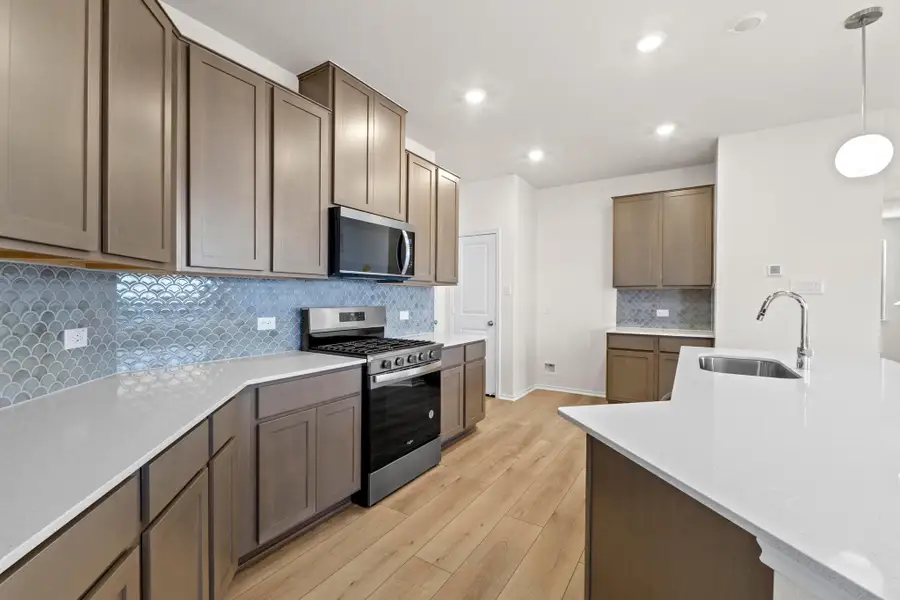 Furnished interior view inside a new home in Salerno - Heritage Collection, Round Rock (Image 11). Furnished interior view inside a new home in Salerno - Heritage Collection, Round Rock (Image 11).