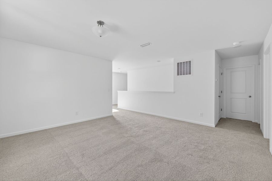 Spacious, unfurnished interior of a new home in Nathans Ridge, Lillington (Image 21).