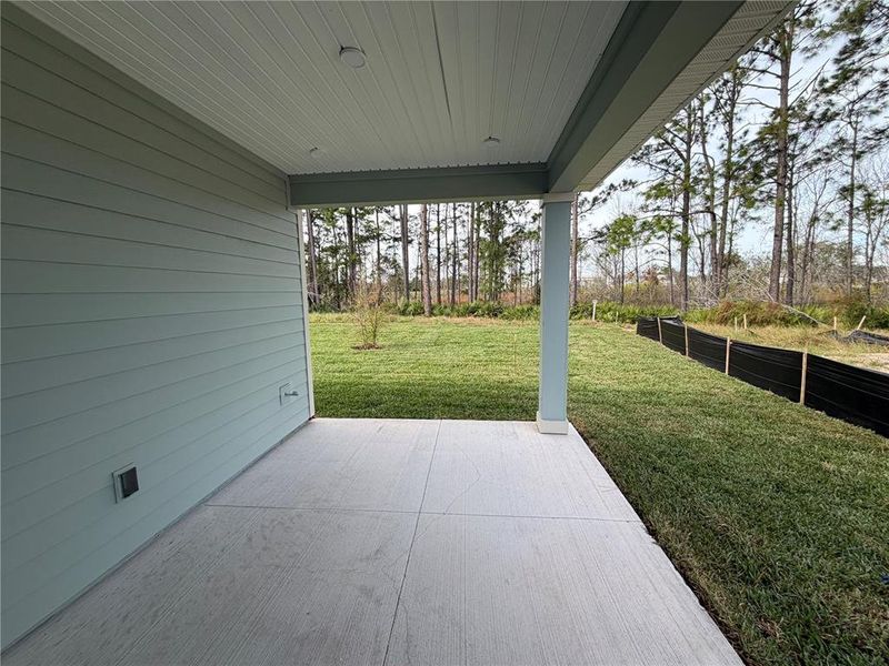 Exterior details and patio area of a home in The Magnolia Series at Reserve East, Flagler Beach (Image 3). Exterior details and patio area of a home in The Magnolia Series at Reserve East, Flagler Beach (Image 3).