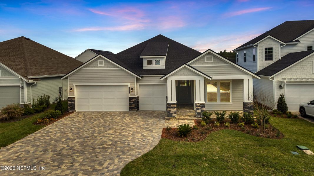 Front exterior of a new home in Middlebourne, St. Johns, FL, highlighting curb appeal (Image 1). Front exterior of a new home in Middlebourne, St. Johns, FL, highlighting curb appeal (Image 1).