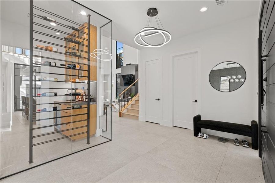 Vast entry with wine room views featuring recessed lighting