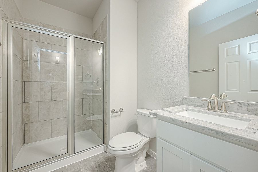 Representative furnished interior of a home built from the Floor Plan 2050 by Colina Homes in Grand Magnolia, Magnolia (Image 5).
