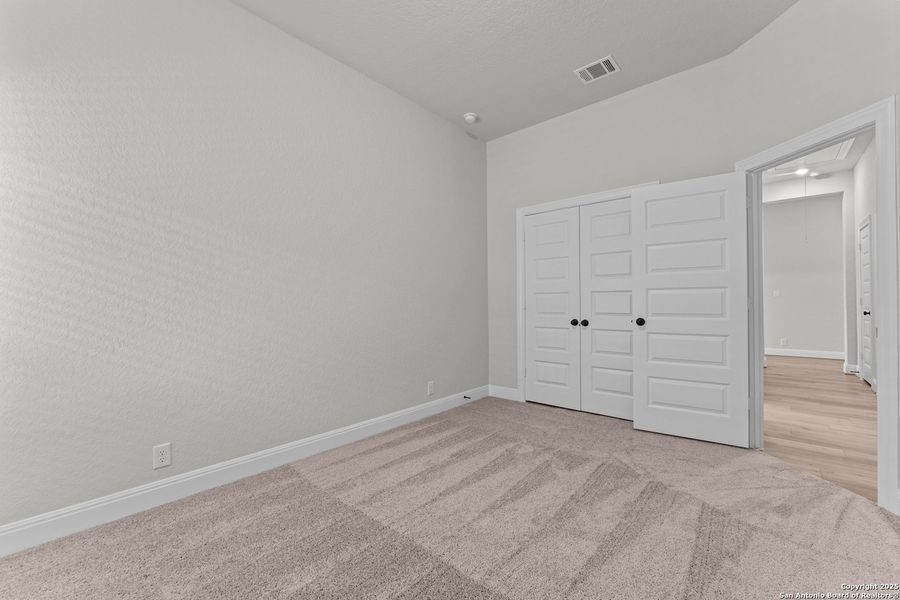 Spacious, unfurnished interior of a new home in Davis Ranch 60', San Antonio (Image 13). Spacious, unfurnished interior of a new home in Davis Ranch 60', San Antonio (Image 13).