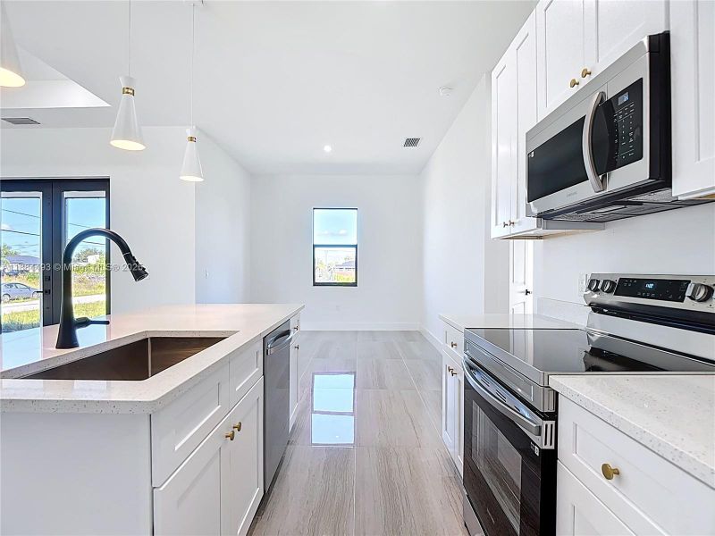 Furnished interior view inside a new home in , Lehigh Acres (Image 7). Furnished interior view inside a new home in , Lehigh Acres (Image 7).
