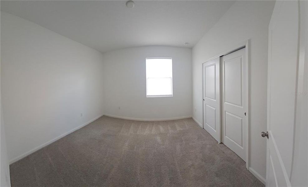 Spacious, unfurnished interior of a new home in Soleil, Kissimmee (Image 19).