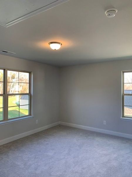 Spacious, unfurnished interior of a new home in Royal Pines, Trinity (Image 24).