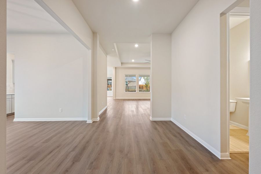 Representative unfurnished interior of a home built from the Carolina by Ashton Woods in The Estates at La Cima, San Marcos (Image 28). Representative unfurnished interior of a home built from the Carolina by Ashton Woods in The Estates at La Cima, San Marcos (Image 28).