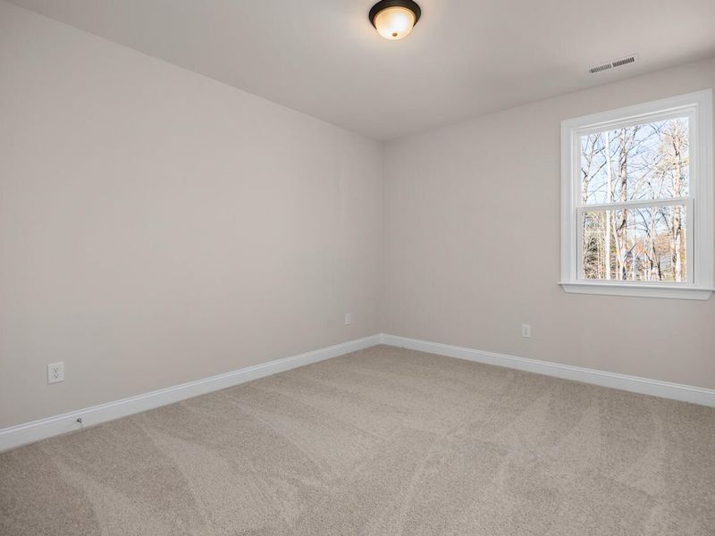 Spacious, unfurnished interior of a new home in Laneridge Estates, Raleigh (Image 27).