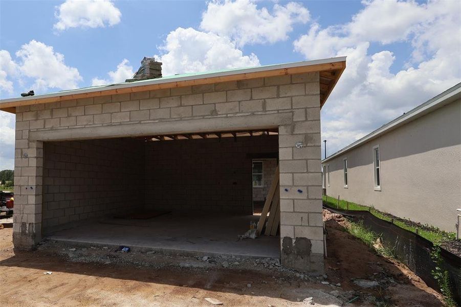 In-progress construction of a new home in Center Lake on the Park, St. Cloud, FL (Image 12).
