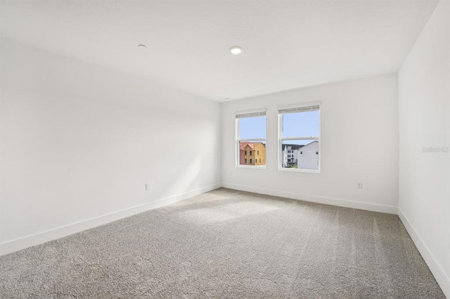 Spacious, unfurnished interior of a new home in Parkview at Hamlin, Winter Garden (Image 39).