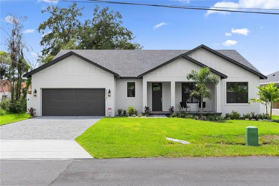 Front exterior of a new home in , Orlando, FL, highlighting curb appeal (Image 1). Front exterior of a new home in , Orlando, FL, highlighting curb appeal (Image 1).