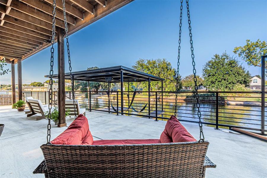 View of patio featuring a water view