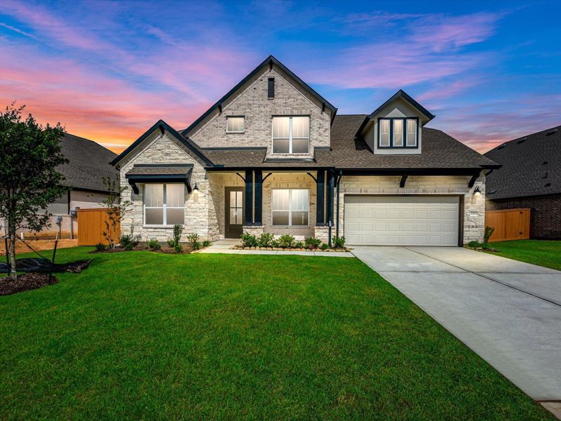 Front exterior of a new home in Wildrye, Waller, TX, highlighting curb appeal (Image 1). Front exterior of a new home in Wildrye, Waller, TX, highlighting curb appeal (Image 1).