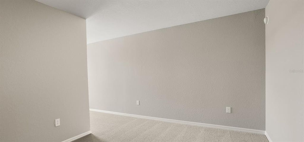 Spacious, unfurnished interior of a new home in Harbor at Lake Henry - Townhomes, Winter Haven (Image 22).