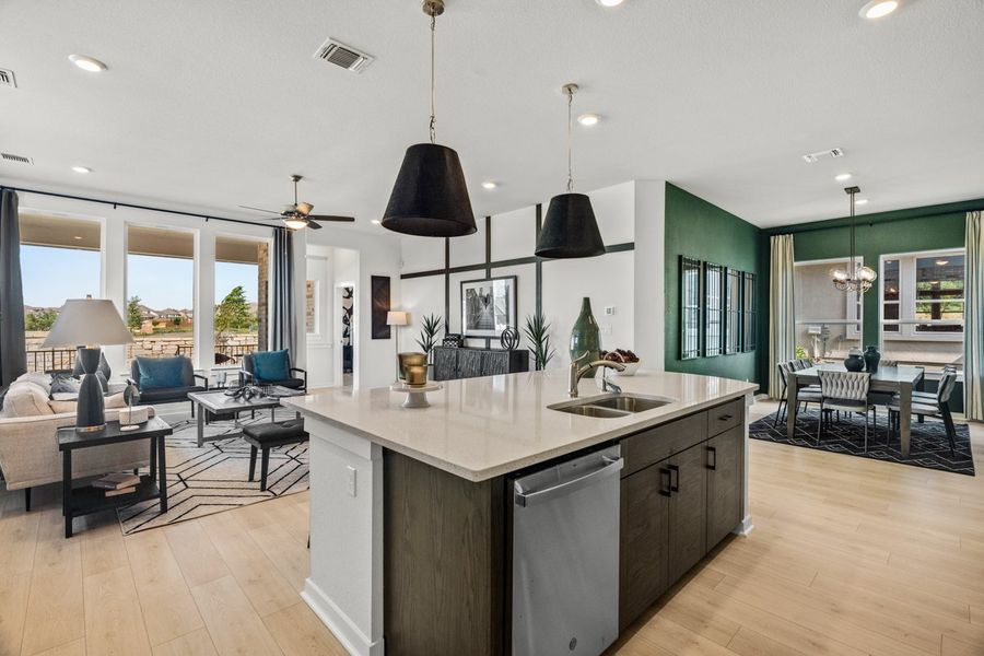 Representative furnished interior of a home built from the Peyton by Chesmar Homes in University Heights, Round Rock (Image 3).