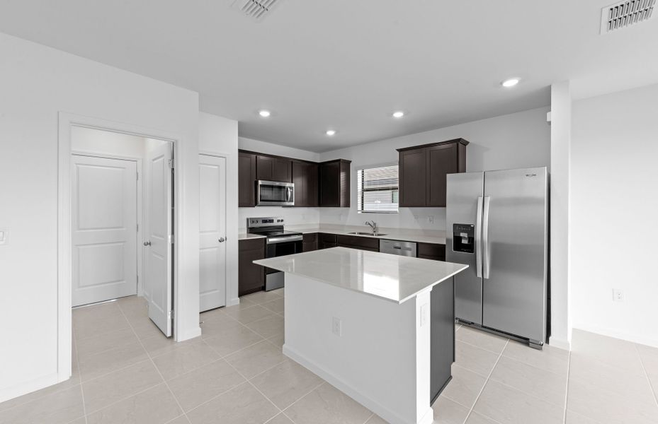 Furnished interior view inside a new home in Caloosa Cove, Labelle (Image 10).