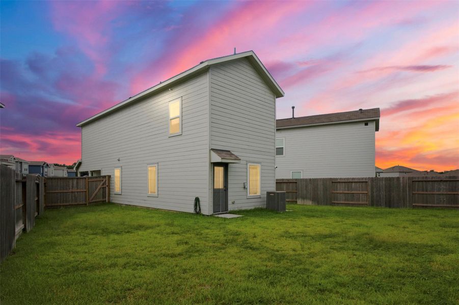 Exterior details and patio area of a home in Tavola, New Caney (Image 24).