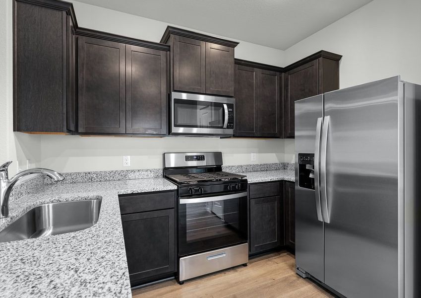 The kitchen has beautiful wood cabinetry. The kitchen has beautiful wood cabinetry.